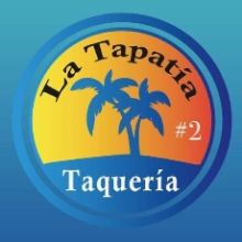 La Tapatía #2 Taqueria logo: palm trees against a sunset